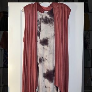 Printed sleeveless dress with sleeveless cardigan.